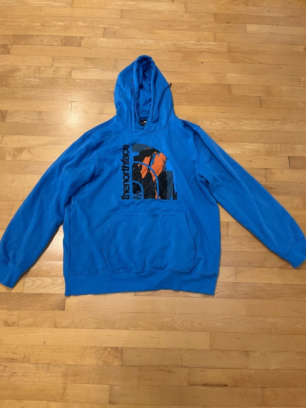 The North Face Bright Blue Pullover Hoodie with Graphic Logo